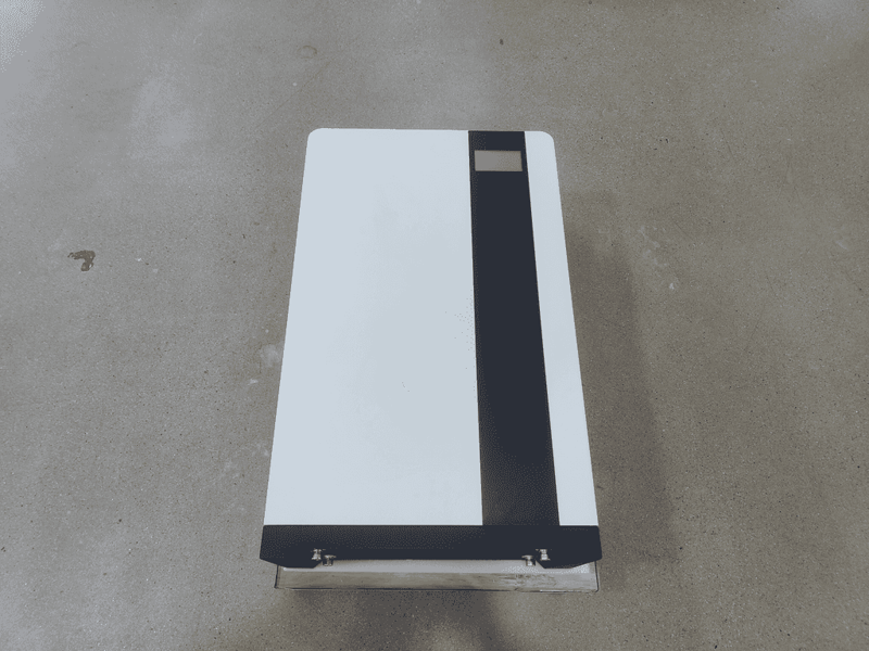 NSTLV-10.2K home energy storage battery showing flexible wall-mounted installation and floor-standing option with universal ground wheels.