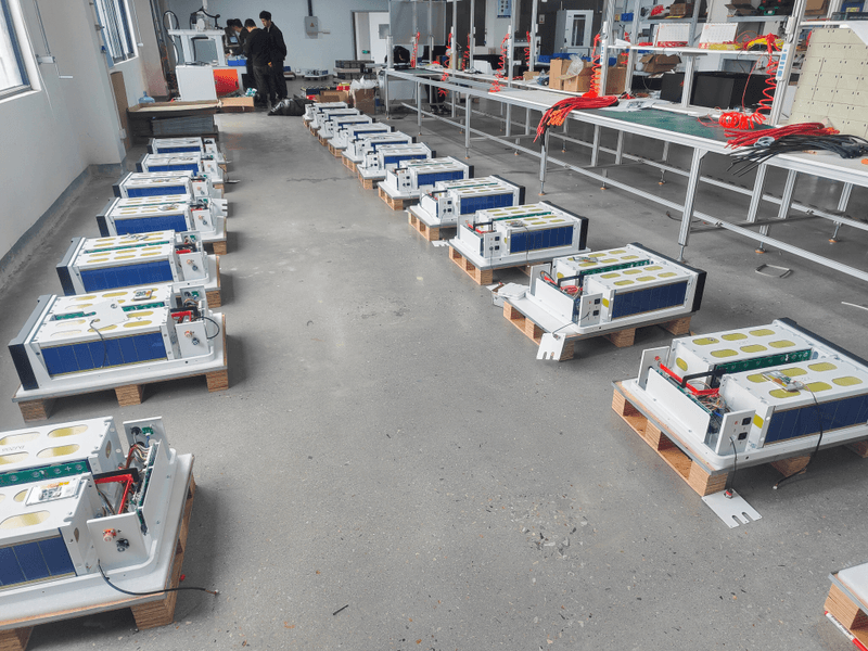 Production and assembly line of Rakour 51.2V low-voltage home battery modules, showcasing the standardized LiFePO4 cell platform before final rack, wall, or ground configuration.